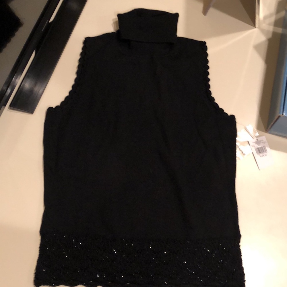 Brand new with tags Context sleeveless sweater top